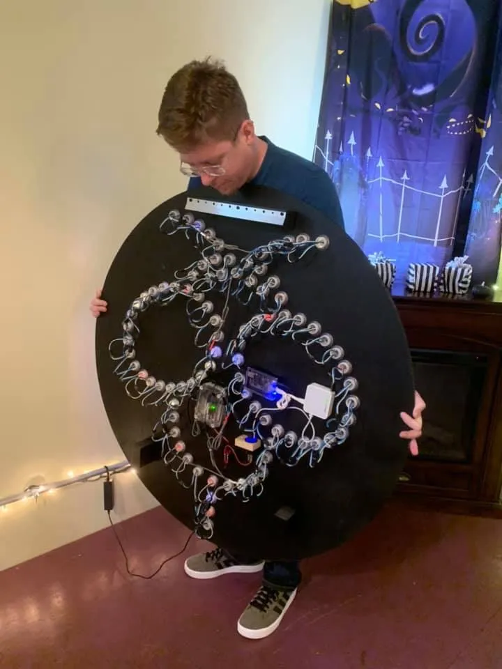 Branden showing the original "guts" of the bee