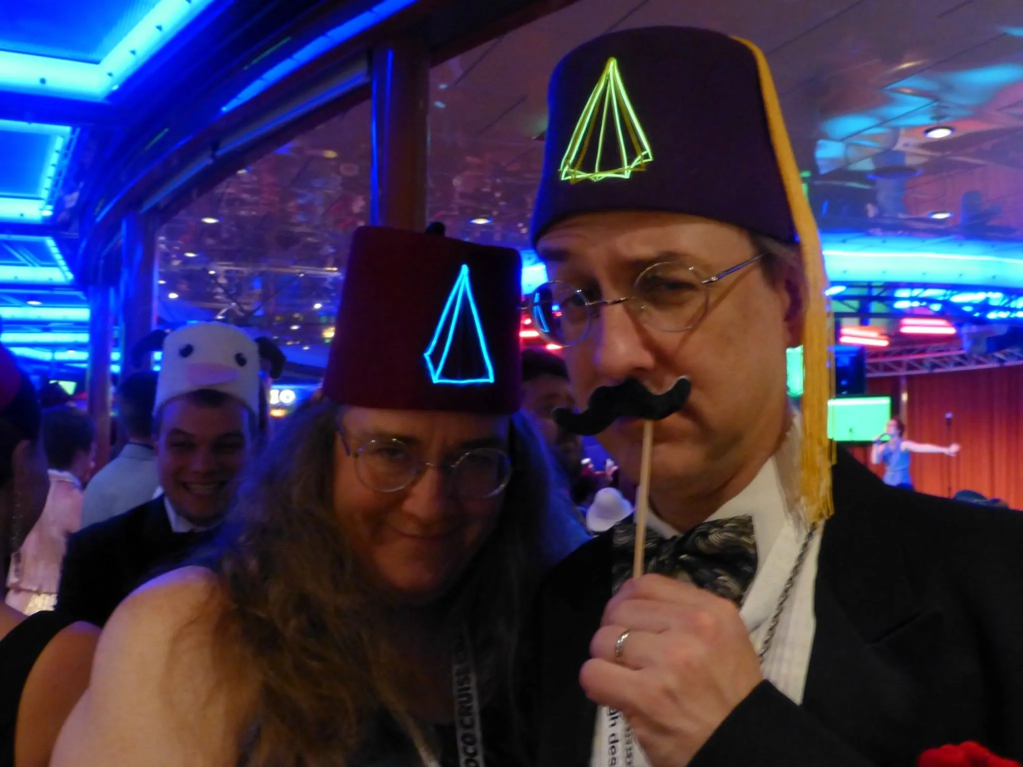 Andy &#x26; Kristen Looney wearing the fezzes