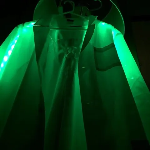 The hug jacket glowing green