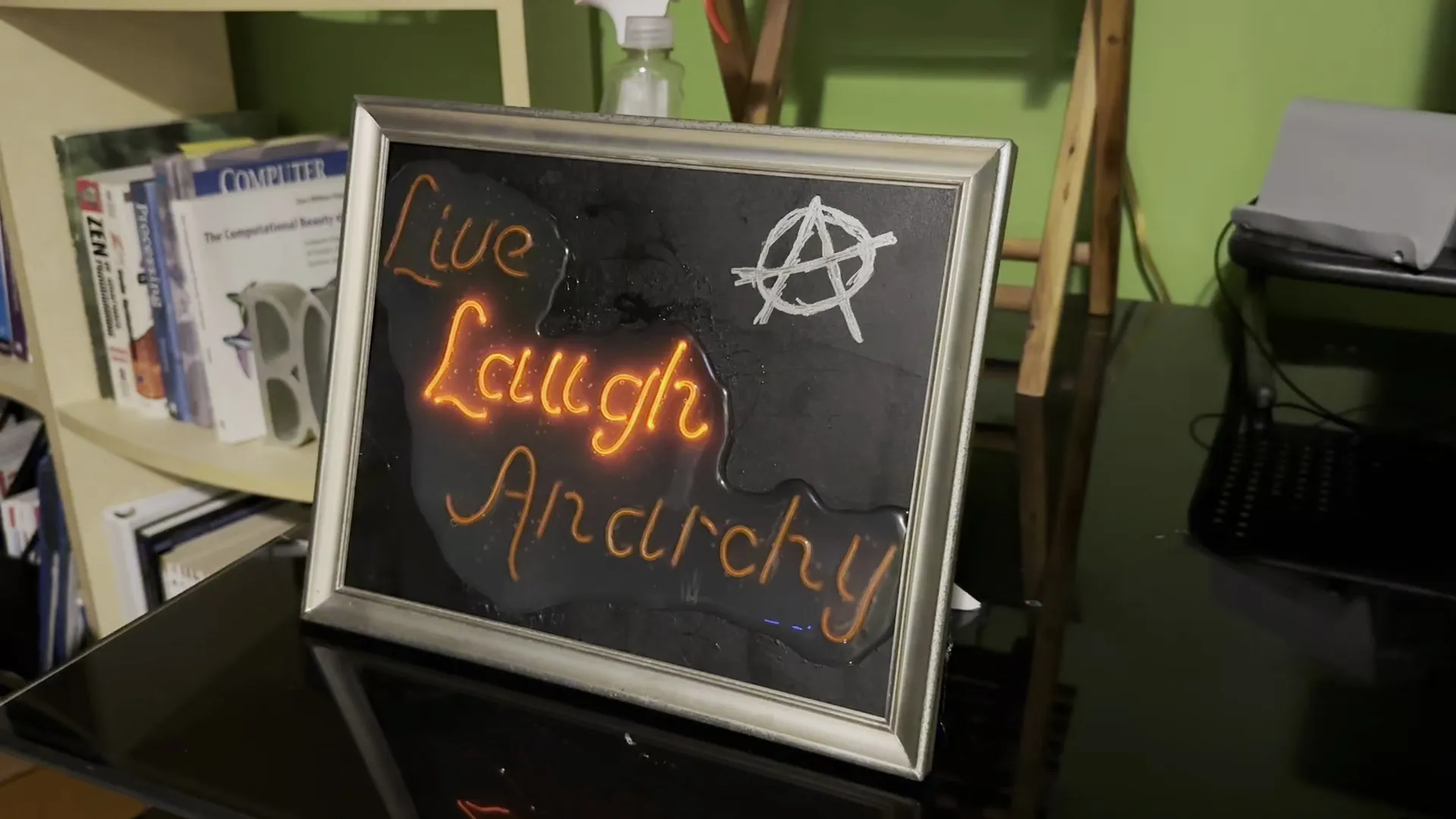 EL wire sign that says Life Laugh Anarchy
