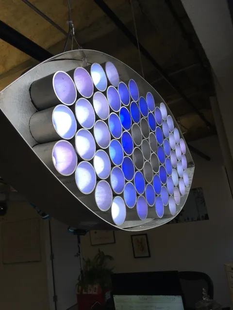 An abstract, glowing aluminum eye