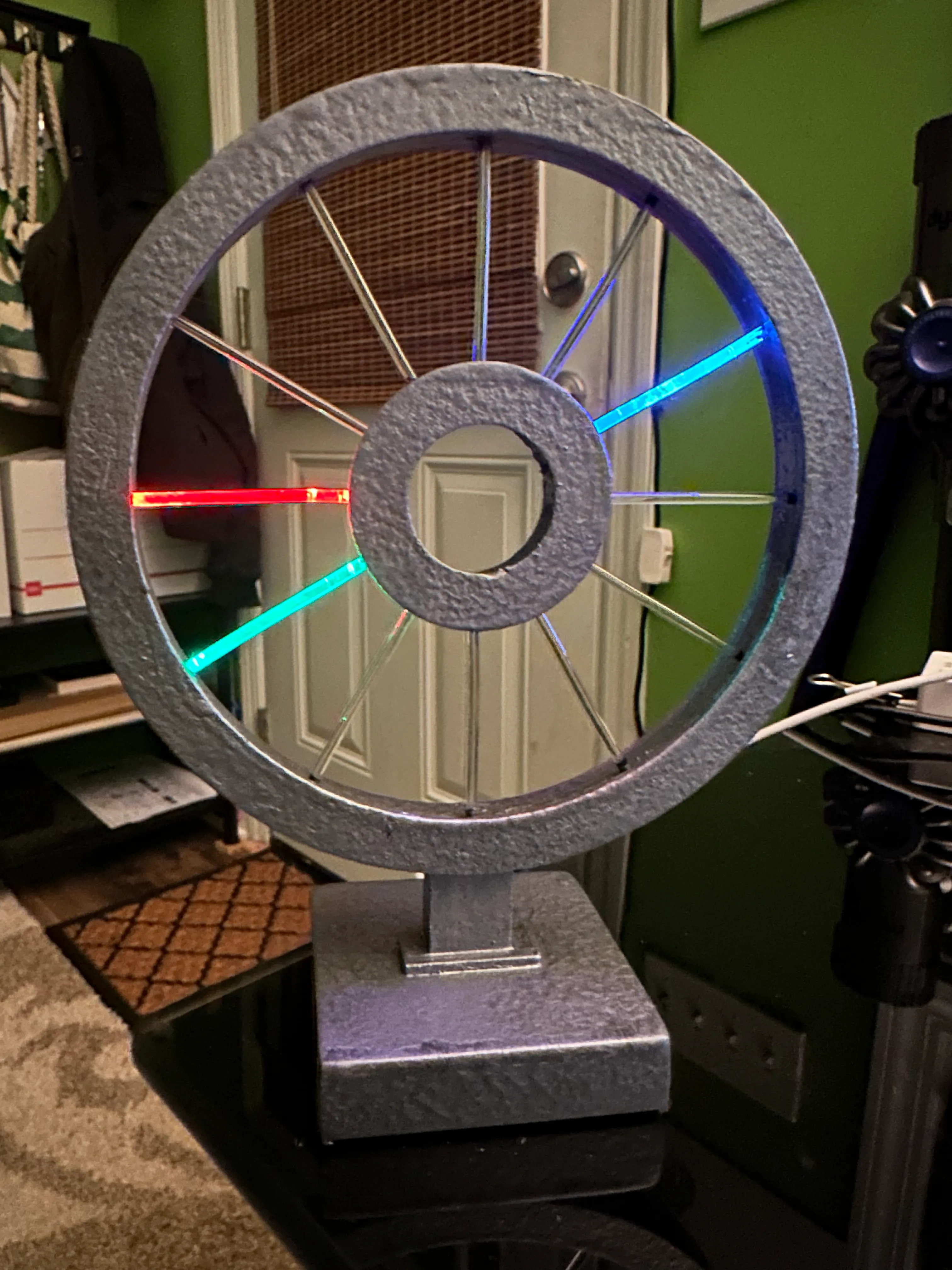 A small circular artifact with glowing lines