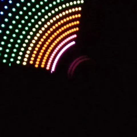 Concentric colorful glowing dots