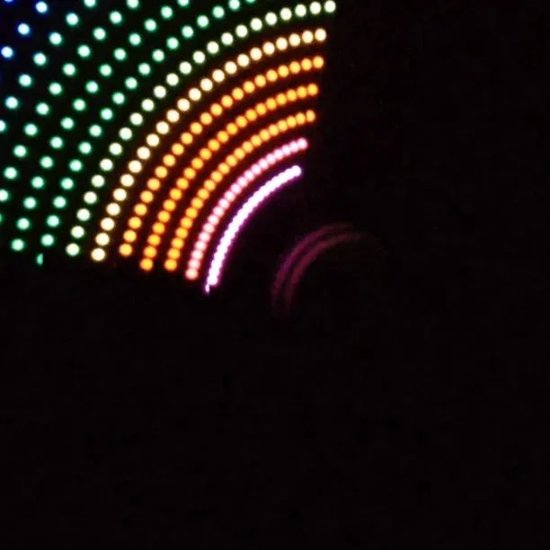 Concentric colorful glowing dots